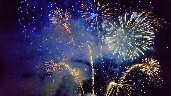 A stunning professional fireworks display at night, showcasing the best fireworks for luxury mountain resorts 