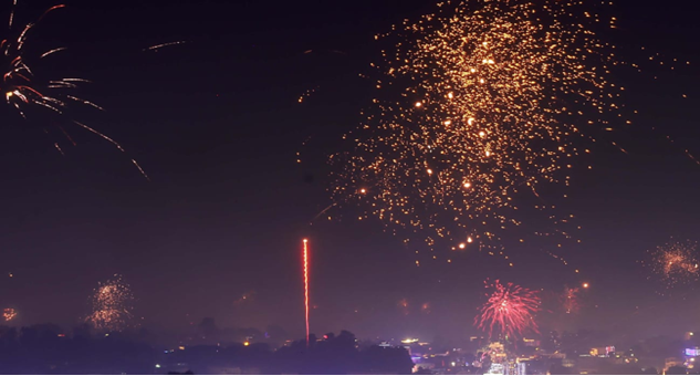 Certified Firecrackers in Dehradun lighting up the night sky during festival celebration with colorful fireworks display 