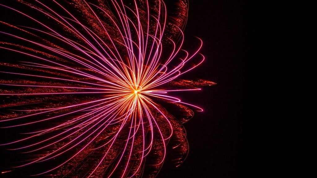 Crossette fireworks effect creating split pattern in the sky