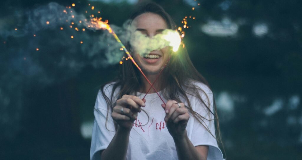 Pollution-Free Fireworks in Dehradun - girl holding green sparklers