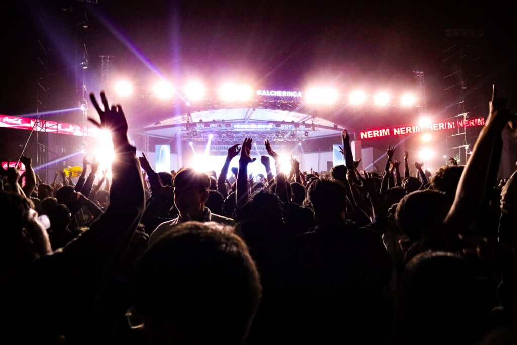 College festival fireworks in India with crowd and stage lighting